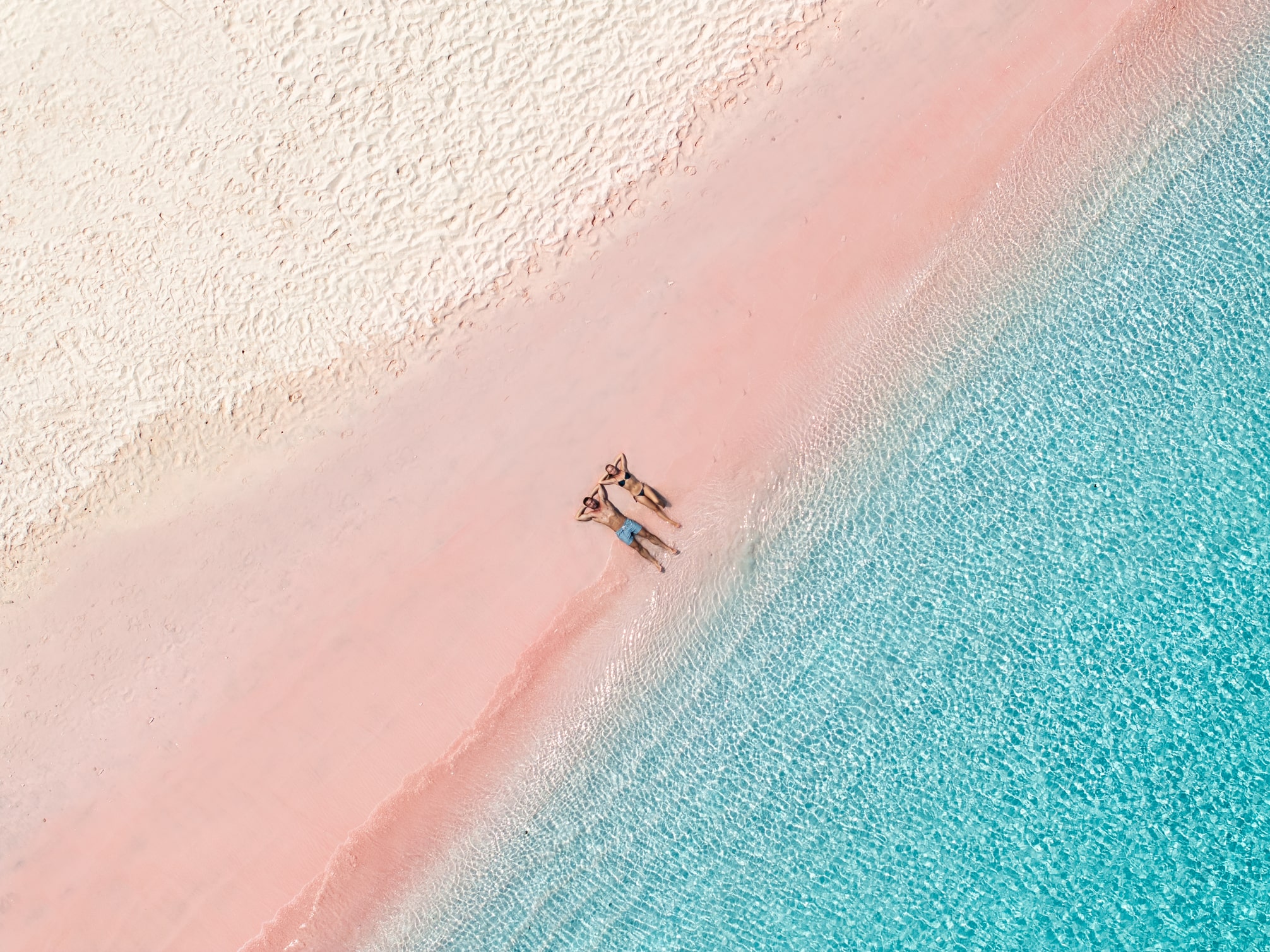 A couple relaxing on a beach